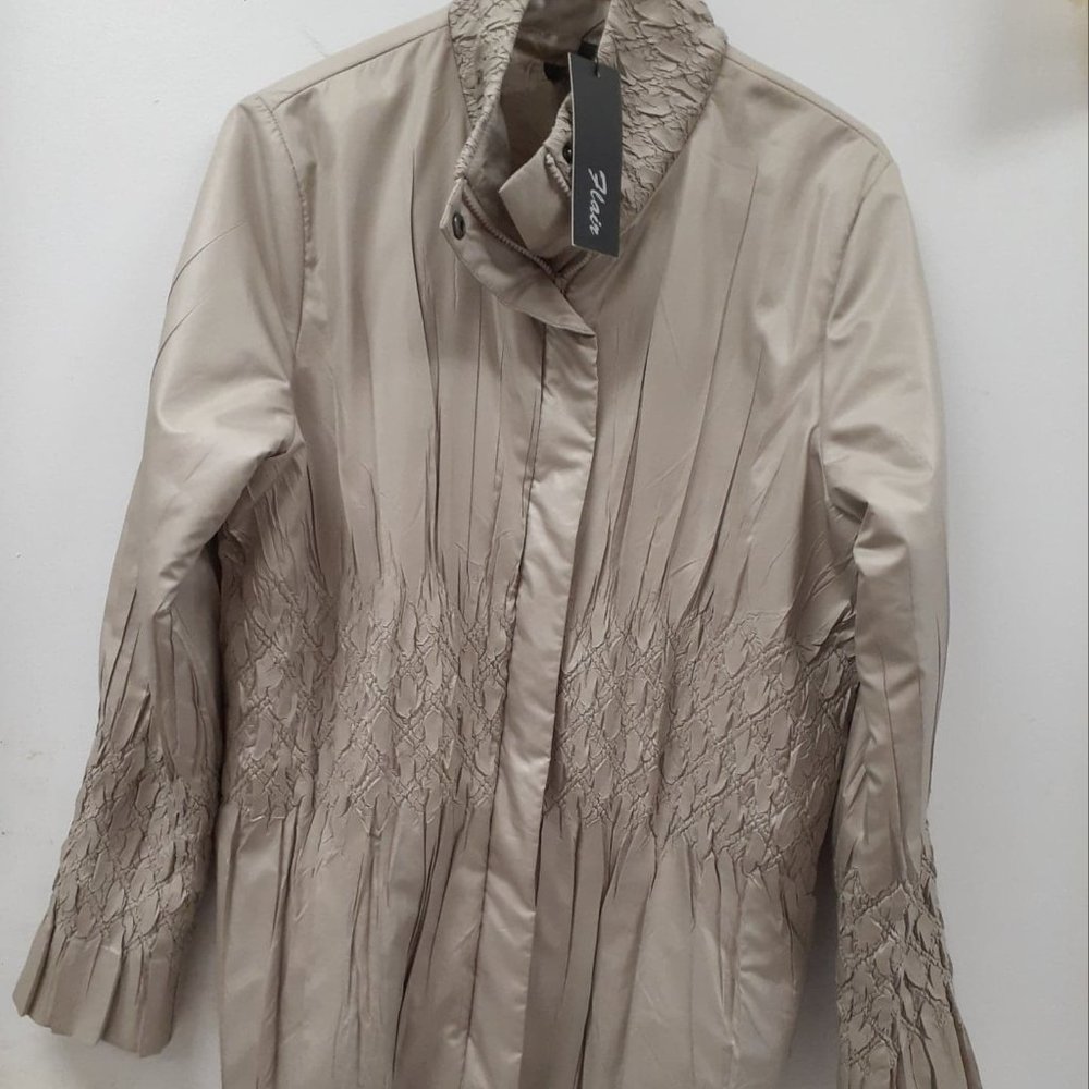Krinkle textured jacket.  Exquisitee Detail